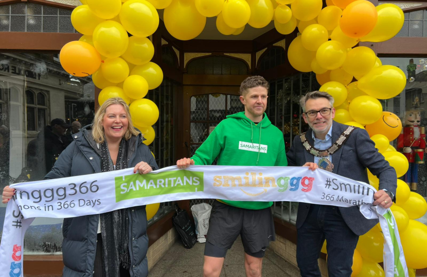 Mims Davies MP celebrates in East Grinstead with James Cooper who ran a marathon a day for charity