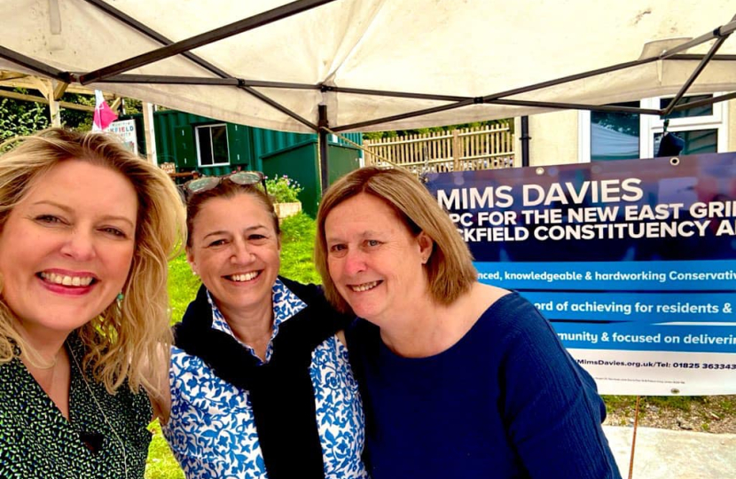 Mims Davies speaking with residents at her Uckfield Farmers Market stall