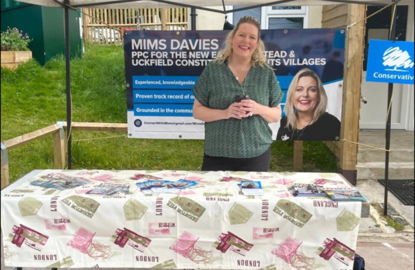 Mims Davies speaking with residents at her Uckfield Farmers Market stall