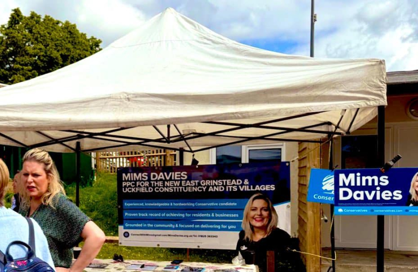 Mims Davies speaking with residents at her Uckfield Farmers Market stall