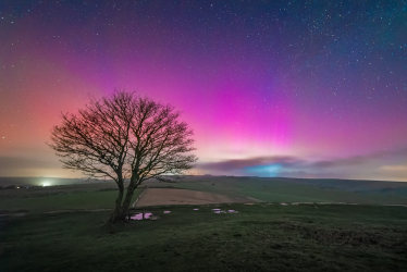 Aurora Borealis At Cissbury Ring by Michael Steven Harris